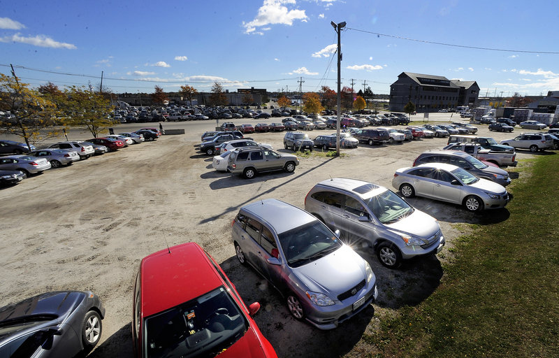 A Commercial Street parking lot at J.B. Brown & Sons is the proposed site of a 131-room Courtyard by Marriott that's expected to open sometime in 2014.