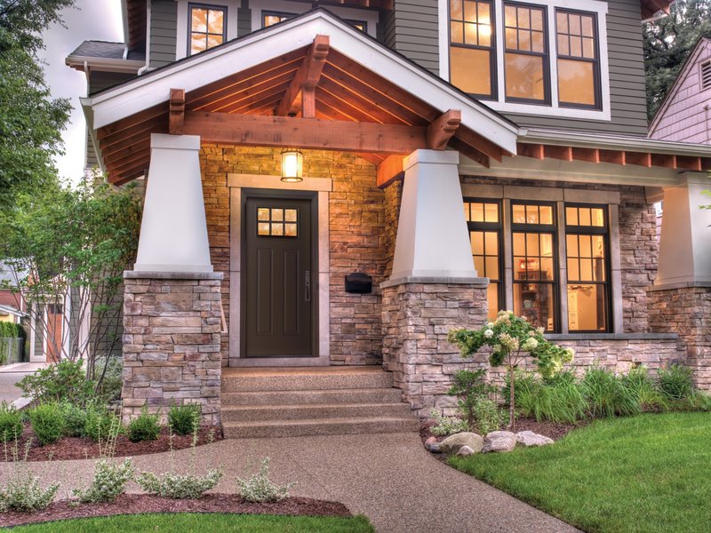 A Craftsman-style door from the Home Again by Hancock Lumber line provides a clean, elegant entry that adds to this home’s exterior. The Therma-Tru door is made of fiberglass but looks like wood.