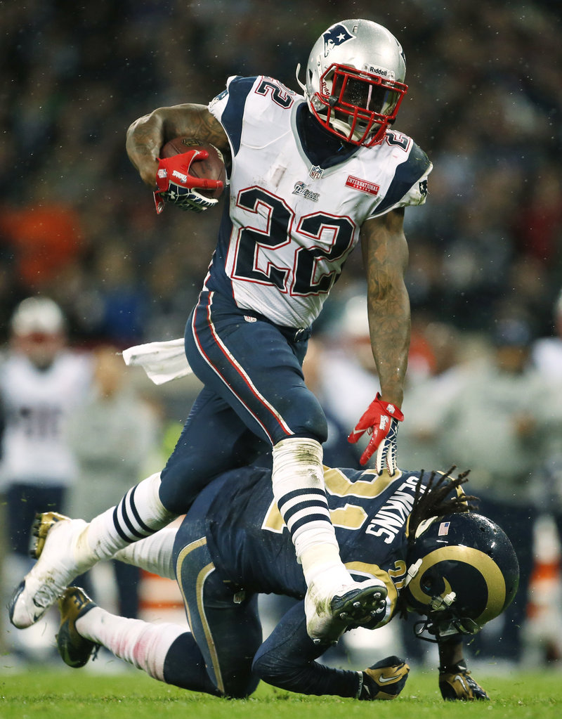 Stevan Ridley tramples past the St. Louis Rams in Sunday’s lopsided victory in London. Now he’ll make his way south to watch his former high school and college play.