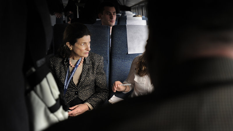 Sen. Olympia Snowe, shown aboard the Amtrak Downeaster’s inaugural ride to Freeport and Brunswick, urges bipartisanship as she retires from public office.