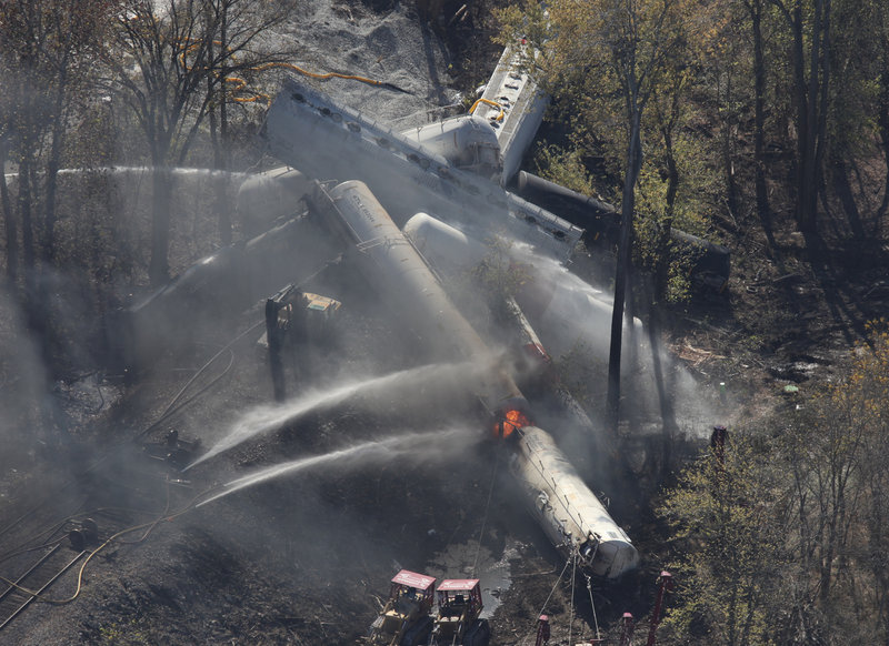 Flames can be seen from the air after an explosion at the site of a train derailment in southern Jefferson County, just south of Louisville, Ky., on Wednesday.