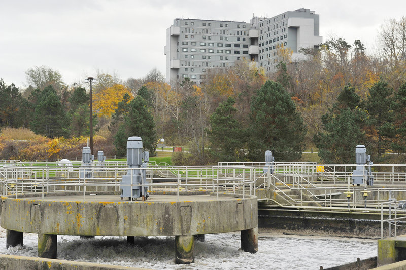 A condo building on the Eastern Prom overlooks Portland’s wastewater treatment plant. Preliminary recommendations from sewage odor consultants for how to reduce bad smells from the plant will be presented to city residents next week.