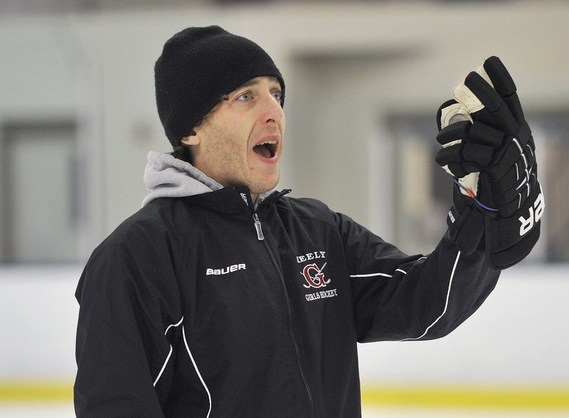 Nate Guerin shouts instructions to his players during the opening day of practice at Family Ice Center. Guerin guided Greely to a state championship in his second season as head coach.