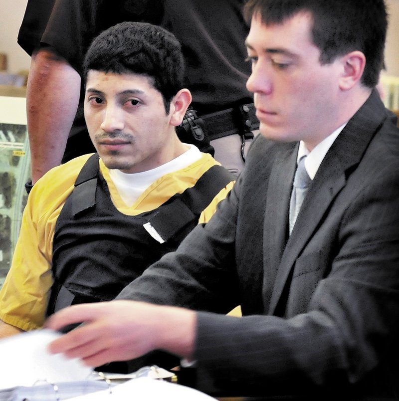Juan Contreras, shown with his attorney earlier in his trial, told Justice Michaela Murphy Thursday, “It’s what’s right,” during questioning on changing his plea to guilty.
