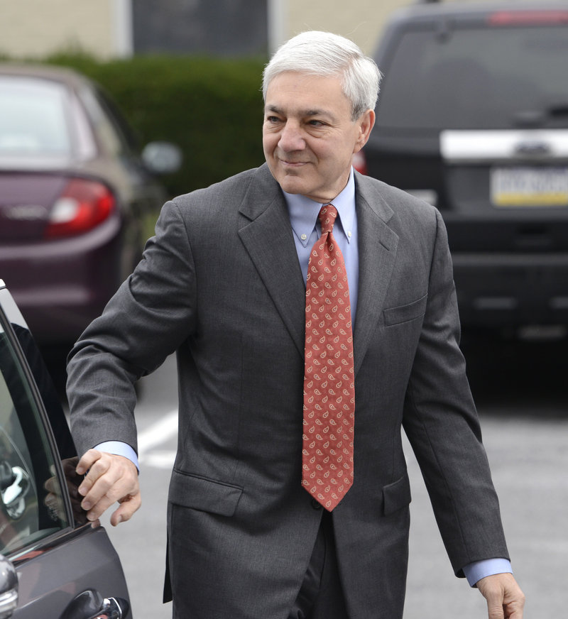 Former Penn State president Graham Spanier arrives for court Wednesday. He was arraigned and released on bail after a brief appearance.