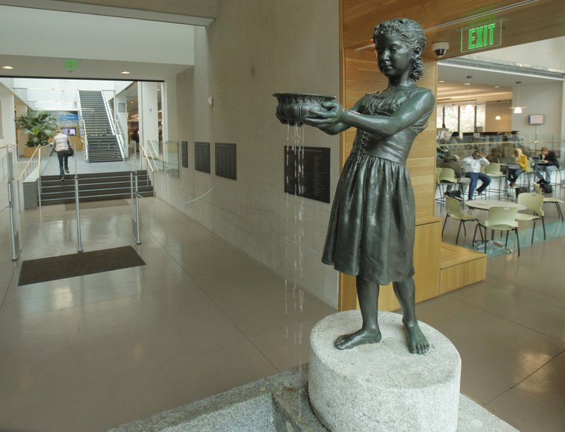 The library’s best-known piece of art may be “The Little Water Girl,” which stands in the lobby.