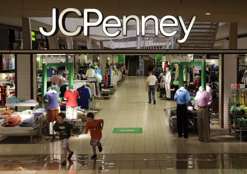 In this Tuesday, June 19, 2012 file photo, shoppers walk in a J.C. Penney story in Plano, Texas. J.C. Penney Co. reported a bigger-than-expected loss in the third quarter on plummeting sales as customers continue to reject its move get rid of blockbuster sales in favor of everyday low pricing, according to reports Friday, Nov. 9, 2012. (AP Photo/LM Otero)