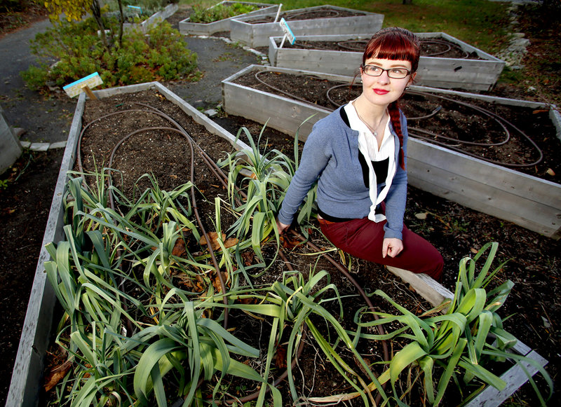 Holly Seeliger, elected to represent District 2 on the school board, poses at the Reiche Elementary School Community Garden.
