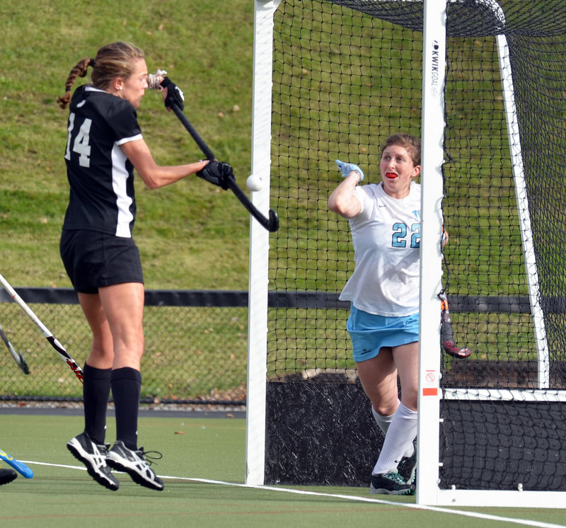 Lauren Schroeder bats a ball out of midair to score Bowdoin’s only goal Sunday in an NCAA Division III field hockey quarterfinal against Tufts. Tufts rallied in the second half for a 2-1 win.