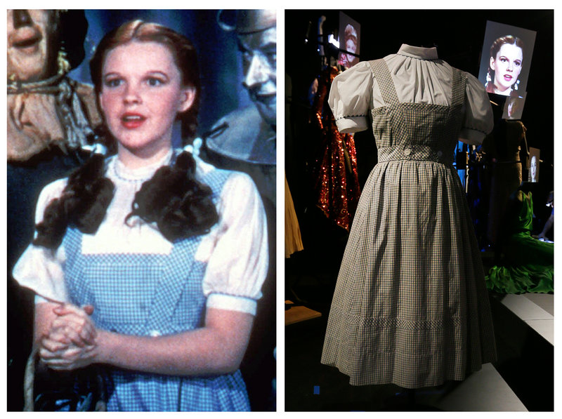 Judy Garland portrays Dorothy in “The Wizard of Oz.” At right is the dress she wore.