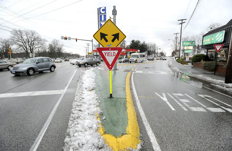 The Maine Department of Transportation wants to replace this yield sign with a signal light at the Five Points intersection in Biddeford to improve traffic flow and safety. A public meeting will be held this week.