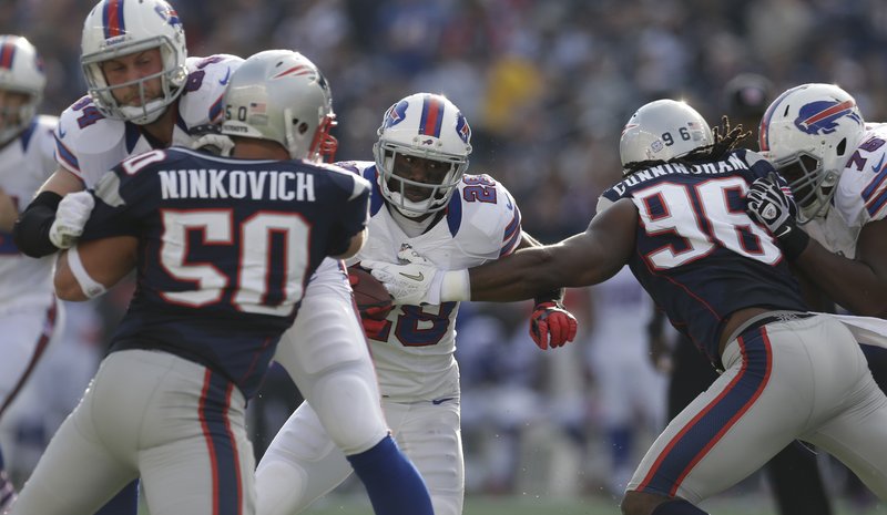 Buffalo Bills running back Fred Jackson (22) looks for a hole Sunday on a run against the Patriots. New England is giving up 382 yards per game, the eighth highest in the NFL.
