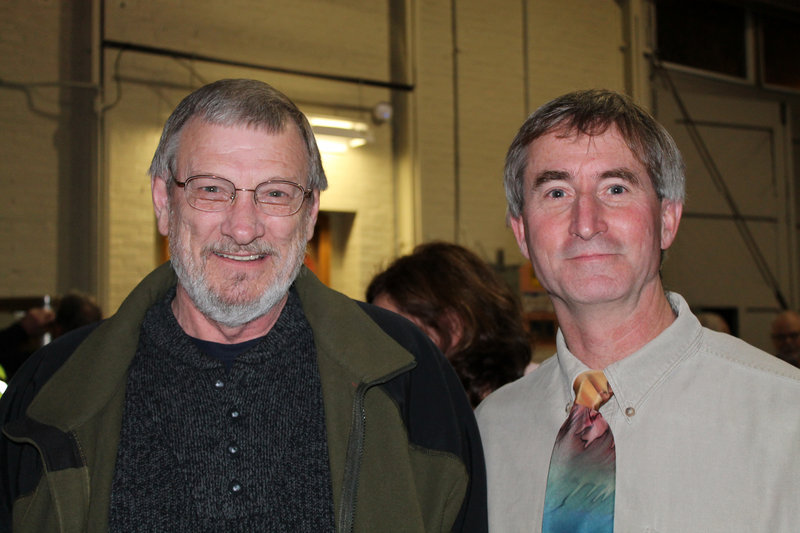 John Wise, donating artist from Buxton, and Andy Greif, co-founder of Community Bicycle Center in Biddeford.