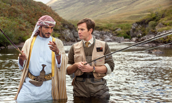 Amr Waked and Ewan McGregor in “Salmon Fishing in the Yemen,” the featured film this week at the York Public Library.