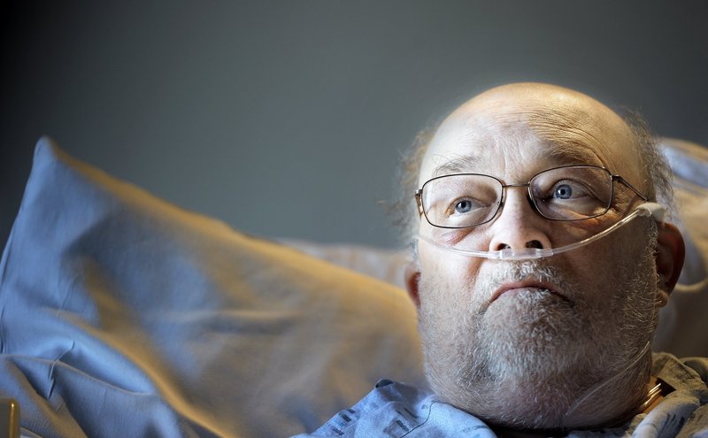 Joseph Stackpole is shown in his hospital bed at Maine Medical Center on Oct. 26. Stackpole lived long enough to see Maine voters approve same-sex marriage on Election Day.