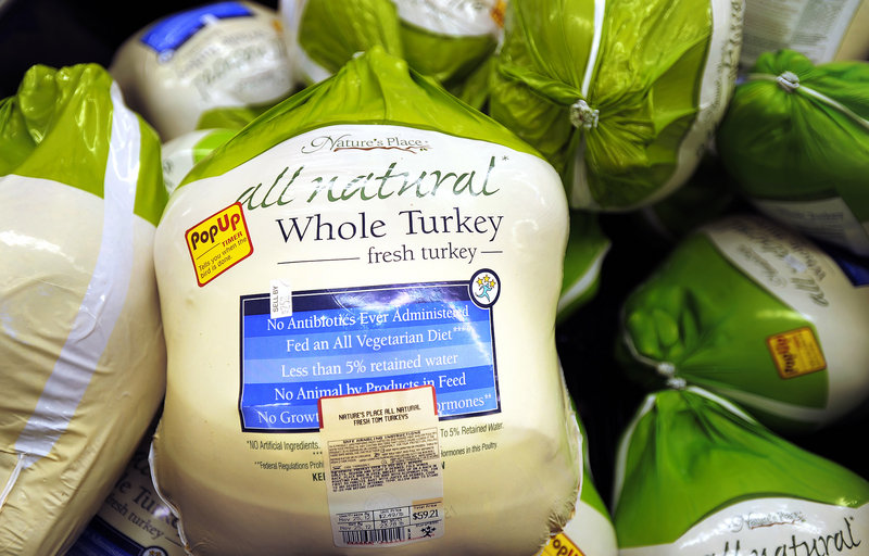 Frozen turkeys, at 49 cents a pound, sit at a Portland Hannaford store. The top local price for a frozen turkey last week was $1.89 a pound at Whole Foods.
