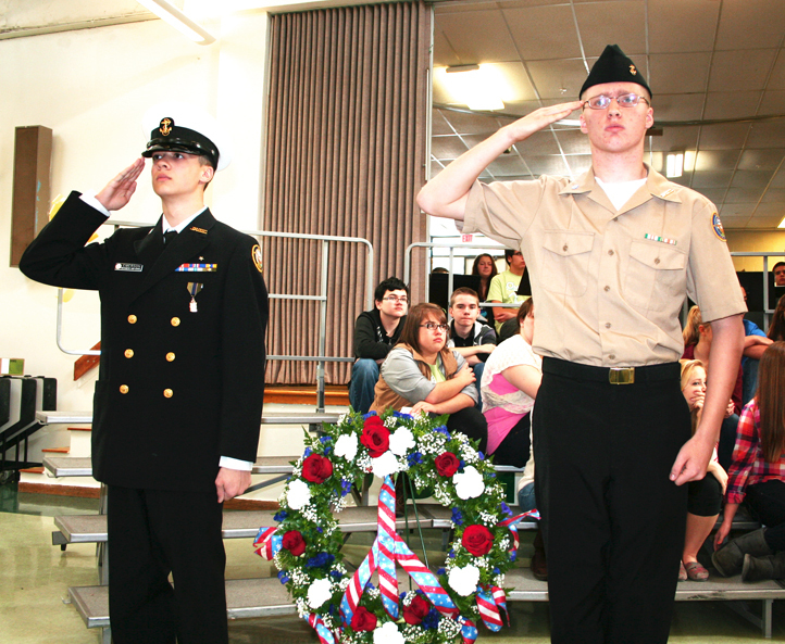 Bonny Eagle High School Navy Junior Reserve Officers Training Corps student members David Emerson, left, and Kiel Carson preside over a wreath ceremony held during the school's annual Veterans Day Celebration. Members of the school's N.J.R.O.T.C. performed a flag-folding ceremony and laid the wreath at the Vietnam Memorial in front of the school. The Bonny Eagle High School band, jazz band and chorus also performed.