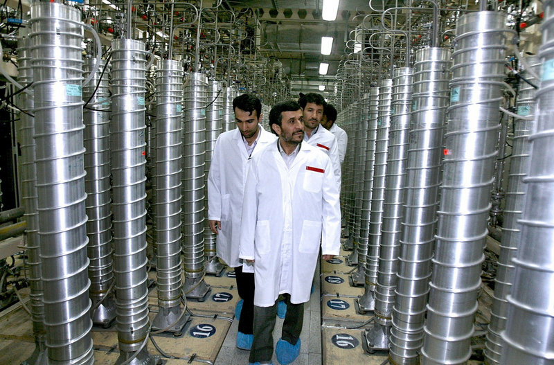 Iranian President Mahmoud Ahmadinejad, center, visits the Natanz Uranium Enrichment Facility, some 200 miles south of the capital of Tehran, in this photo taken in April 2008.