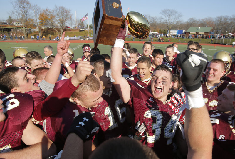 Nick Kenney and his Thornton Academy teammates long looked forward to one moment, when they would be raising the Gold Ball as the Class A state champions. That moment came Saturday with a 37-23 win over Lawrence.
