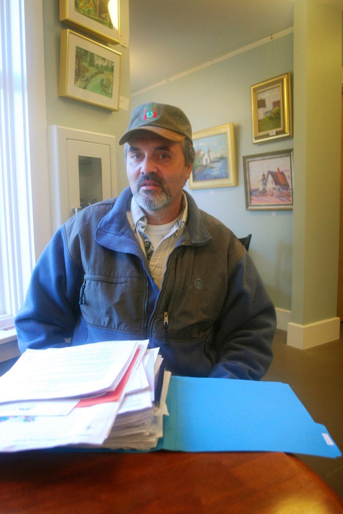 Fred Thomas sits behind a year’s worth of research that he collected as chairman of the Islesboro Deer Reduction Committee. “It’s been quite a task,” Thomas said.