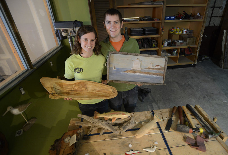 Bekah and David Clark, owners of Tote Road, display their hand-crafted wood products Monday at their downtown location in Biddeford, which has a program to help new businesses get off the ground.
