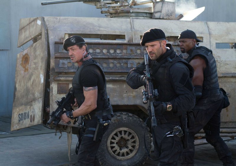 Sylvester Stallone, left, Jason Statham and Terry Crews in “The Expendables 2.”