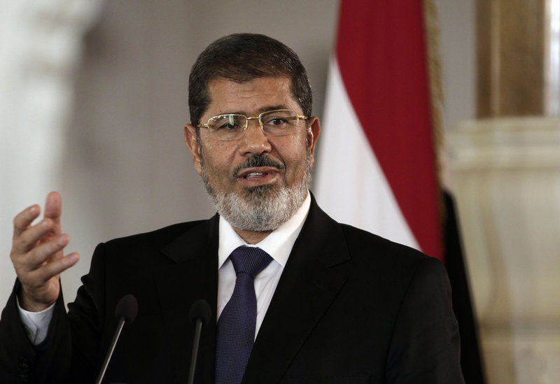 Egyptian President Mohammed Morsi has been thrust into the spotlight as his Islamist government performs a difficult balancing act of appeasing militants and the United States.