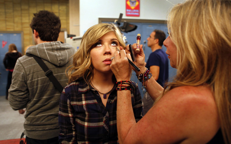 Jennette McCurdy, as “Sam Puckett,” gets a makeup touch-up during taping on the set of “iCarly,” in Hollywood. The Nickelodeon series is coming to an end after five seasons.