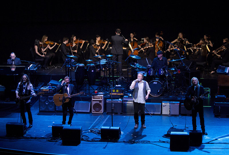The Eagles, from left, Timothy B. Schmit, Glenn Frey, Don Henley and Joe Walsh perform earlier this month with NYU students at the Beacon Theater.