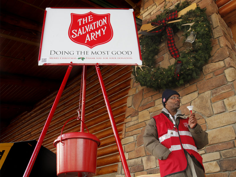 Danny Mitchell rings the bell Wednesday in front of Cabela’s in Scarborough. Charities such as the Salvation Army say the holiday season tends to draw out the selfless side of people, a job that’s harder to do when Christmas isn’t looming.