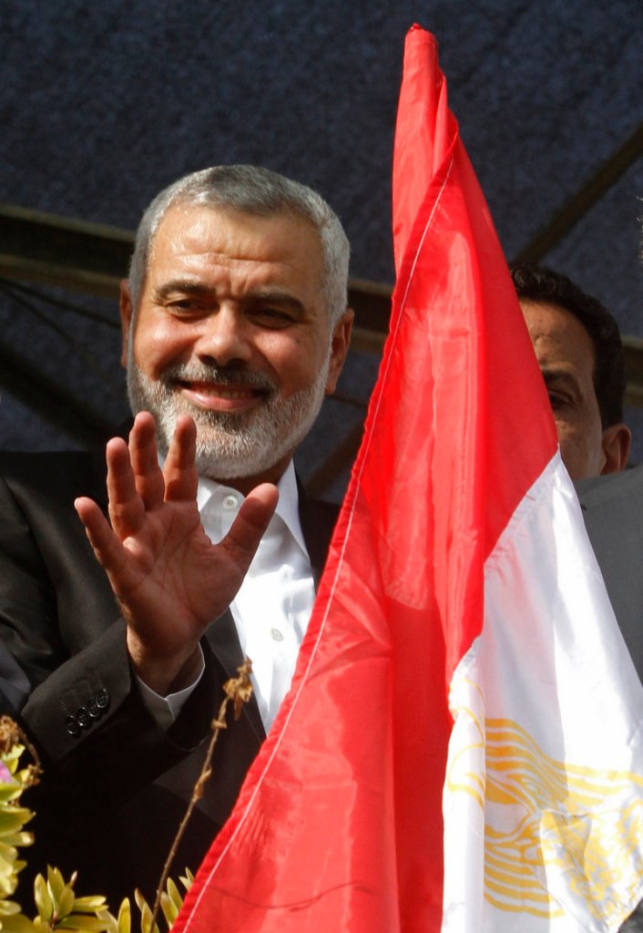 Ismail Haniyeh, Gaza’s Hamas prime minister, waves at the crowd while celebrating the cease-fire.