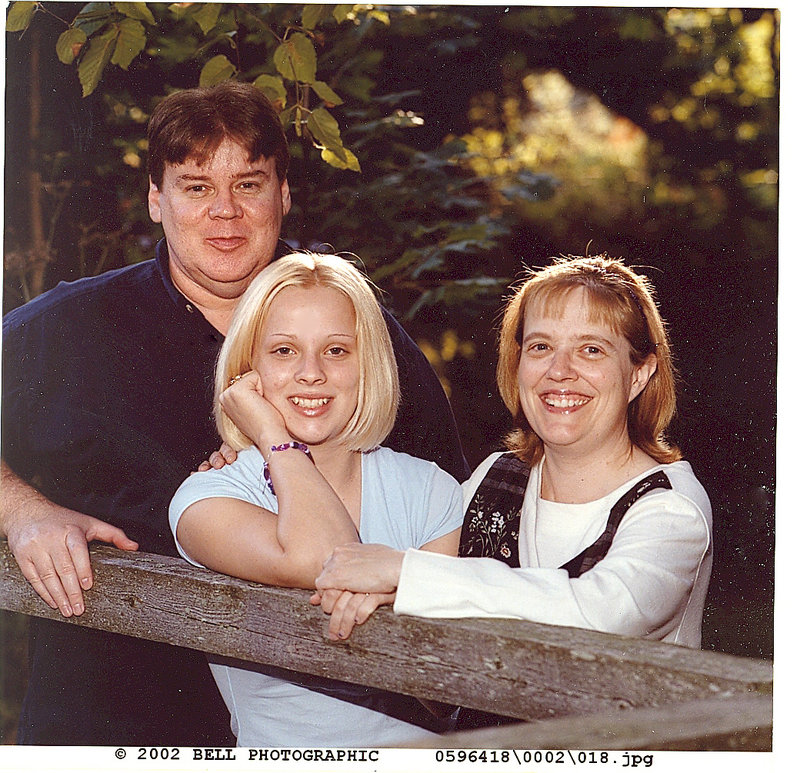 Samantha Folsom, center, appears with her parents, Jon and Joline Turner, in this 2002 photo.