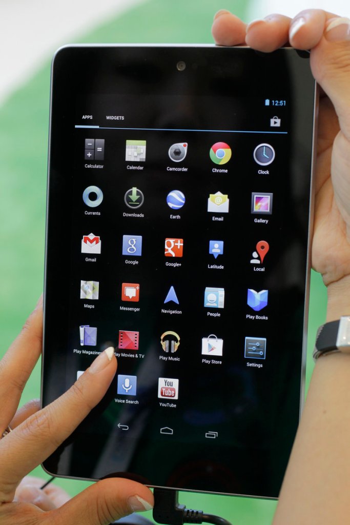 Google’s Cheryl Pon shows off apps on the new Google Nexus 7 tablet. It has access to thousands of applications written for Android smartphones.