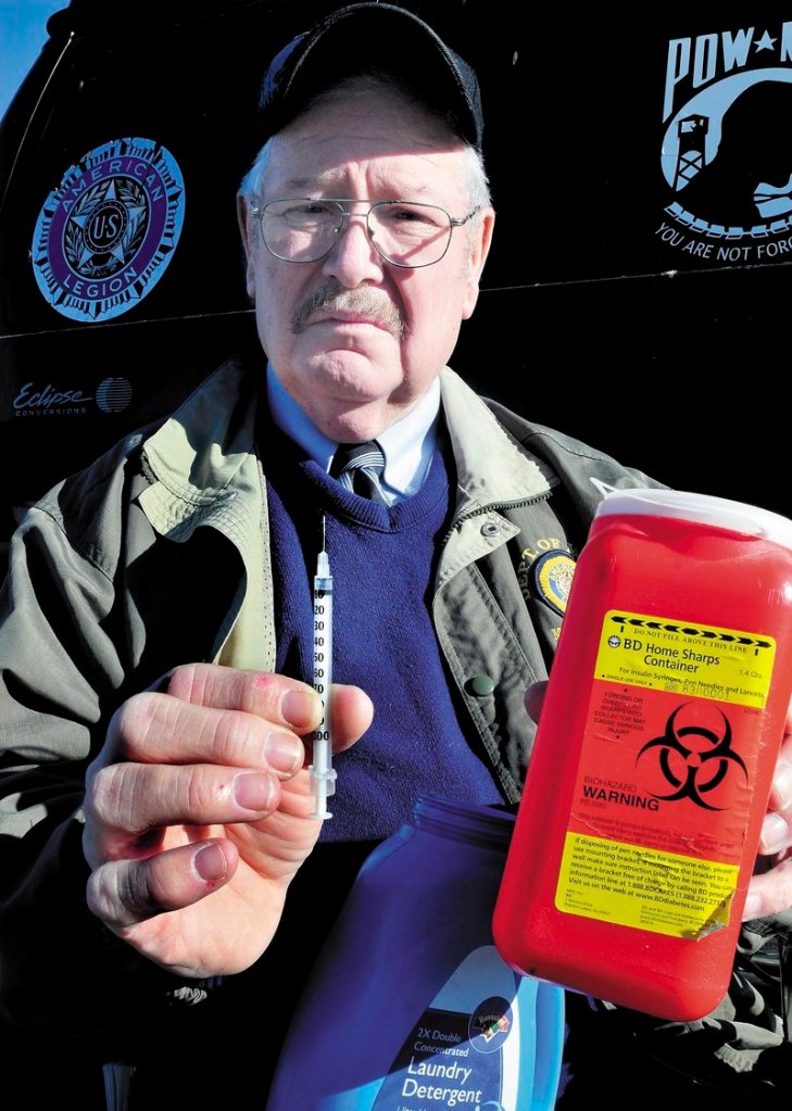 Don Simoneau of Fayette advocates for patients to use approved containers, like the one he is holding, when disposing of needles.