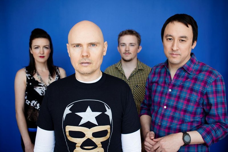 The lineup of Smashing Pumpkins is, from left, bassist Nicole Fiorentino, frontman Billy Corgan, drummer Mike Byrne and guitarist Jeff Schroeder. The Pumpkins play the State on Saturday.