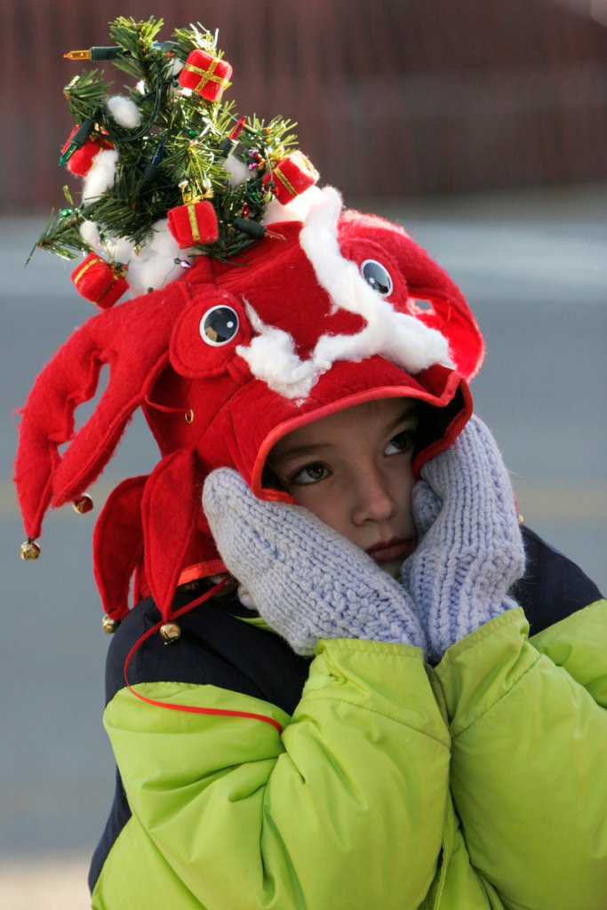 ... a youngster waiting for the Hat Parade to begin ...
