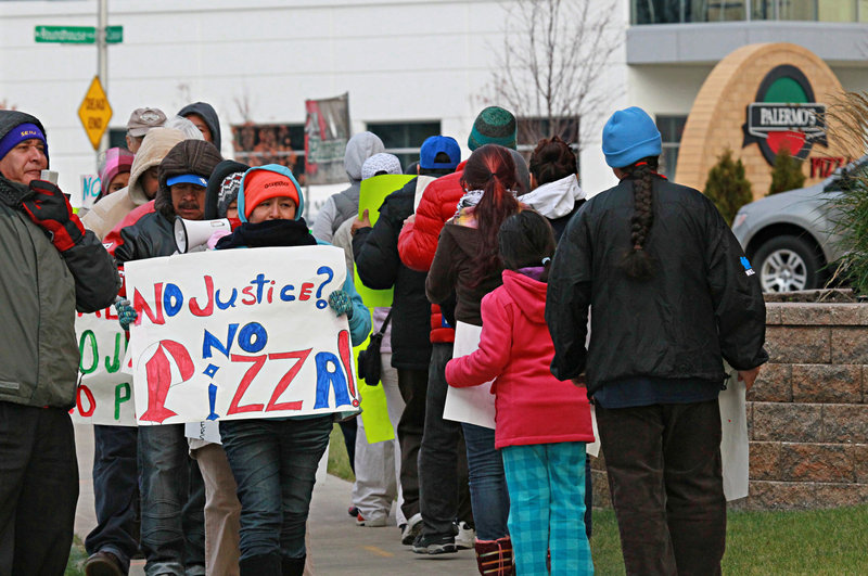 Workers picket recently at Palermo’s Pizza, a frozen pizza manufacturer in Milwaukee, Wis., where efforts to form a union have clashed with immigration enforcement and drawn national attention along with a boycott.