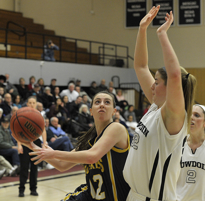 USM has played five games and won them all, adding Bowdoin to its list of opponents after a victory Sunday against St. Joseph’s. Erin McNamara of the Huskies drives to the basket.