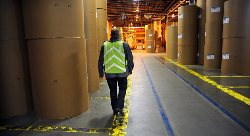 Finished paper is stored in rolls at the UPM Blandin paper mill in Grand Rapids, Minn. Demand for paper has been falling for years, and analysts predict another 18 percent dropoff by 2024. In Maine, the industry employs roughly 7,400 people, about half the number of a decade ago.