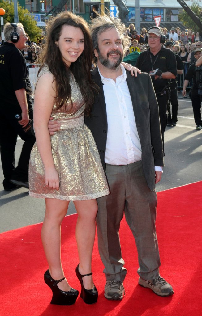 Director Peter Jackson poses with his daughter Katie on the red carpet Wednesday in Wellington, New Zealand.