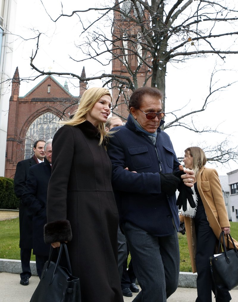 Casino mogul Steve Wynn and his wife, Andrea Hissom, leave City Hall Wednesday in Everett, Mass., where Wynn may apply to build a gambling resort.