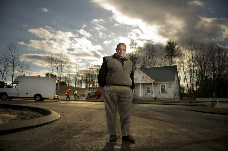 Ronald Boutet of Pine Ridge Realty in Saco visits a housing project Thursday in Old Orchard Beach. He says the loss of the mortgage-interest deduction on second homes would hurt sales.