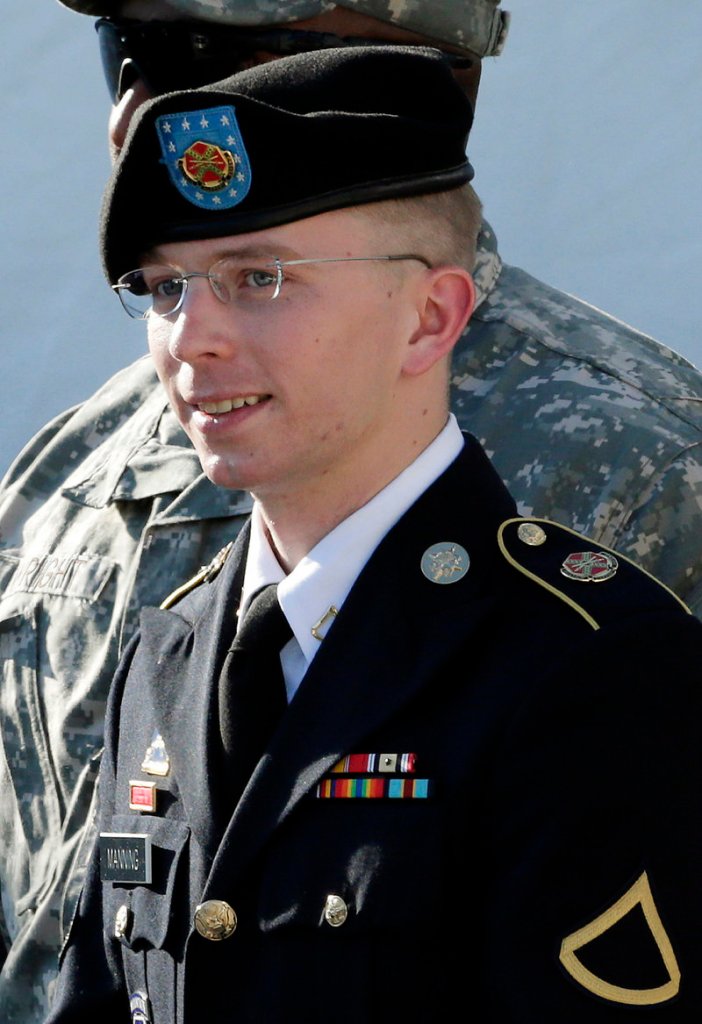 Army Pfc. Bradley Manning is escorted out of a courthouse in Fort Meade, Md., after a pretrial hearing in June. Manning is charged with sending reams of government secrets to WikiLeaks.