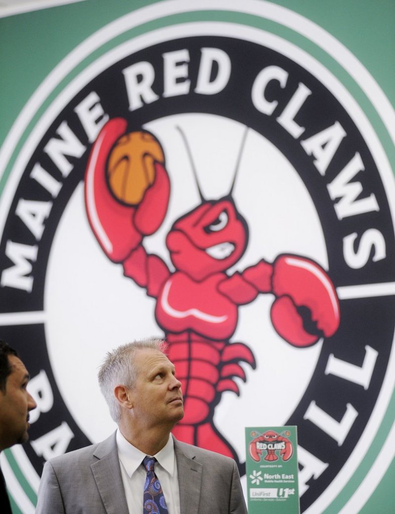 Danny Ainge, president of basketball operations for the Boston Celtics, visits the Maine Red Claws front office last June in Portland. Under a new single-affiliation agreement, the Celtics run basketball operations for Maine’s team.