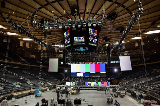 Workers prepare Madison Square Garden for the "12-12-12" concert whose proceeds will aid the victims of Superstorm Sandy. The concert will feature artists Bon Jovi, Eric Clapton, Dave Grohl, Billy Joel, Alicia Keys, Chris Martin, The Rolling Stones, Bruce Springsteen & the E Street Band, Eddie Vedder, Roger Waters, Kanye West, The Who and Paul McCartney.