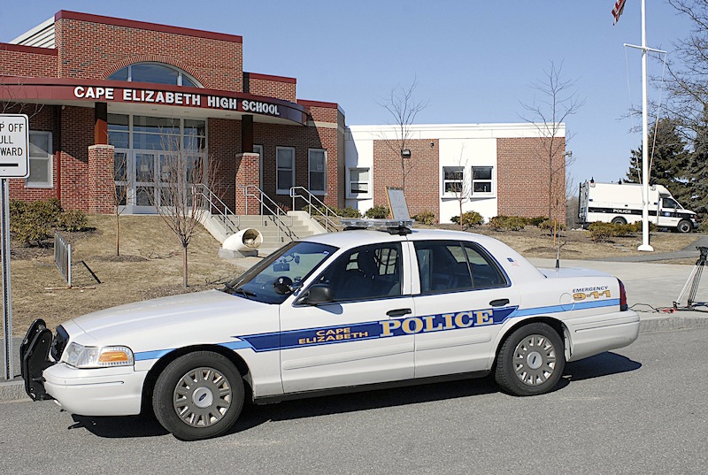 In this March 2008 file photo, a police cruiser sits in front of Cape Elizabeth High School. Police are investigating a Friday, Dec. 10, 2012 marijuana-cookie incident that led to the suspension of nine Cape Elizabeth High School students.