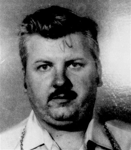 FILE - This 1978 file photo shows serial killer John Wayne Gacy. Three vials of Gacy's blood were recently discovered by Cook County Sheriff's detective Jason Moran. The sheriff�s office is creating DNA profiles from the blood of Gacy and other executed killers and putting them in a national DNA database of profiles created from blood, semen, or strands of hair found at crime scenes and on the bodies of victims. What they hope to find is evidence that links the long-dead killers to the coldest of cold cases and prompt authorities in other states to submit the DNA of their own executed inmates and maybe evidence from decades-old crime scenes to help them solve their own cases. (AP Photo)