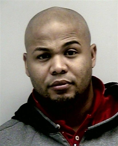 This booking photo provided by the Gwinnett County Sheriff's Department on Tuesday, Dec. 25, 2012, shows former Atlanta Braves center fielder Andruw Jones. Jail records show that Jones is free on bond after being arrested in suburban Atlanta on a battery charge. (AP Photo/Gwinnett County Sheriff's Department)
