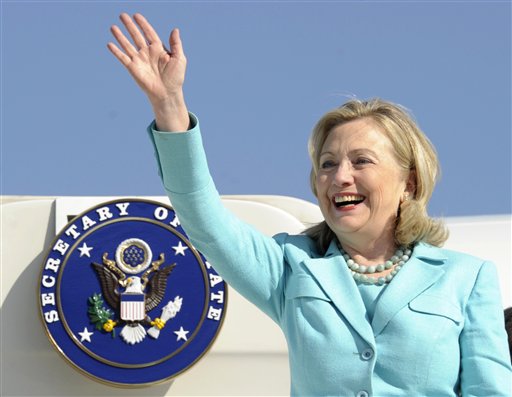 In this June 10, 2011 file photo, Secretary of State Hillary Rodham Clinton waves as the arrives at Lusaka International Airport in Lusaka, Zambia. Clinton has been admitted to a New York hospital after the discovery of a blood clot stemming from the concussion she sustained earlier this month. Spokesman Philippe Reines says her doctors discovered the clot during a follow-up exam Sunday, Dec. 30, 2012. (AP Photo/Susan Walsh, Pool)