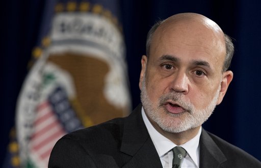 Federal Reserve Chairman Ben Bernanke speaks during a news conference in Washington on Wednesday. The Federal Reserve sent its clearest signal to date Wednesday that it will keep interest rates super-low to boost the U.S. economy even after the job market has improved significantly.